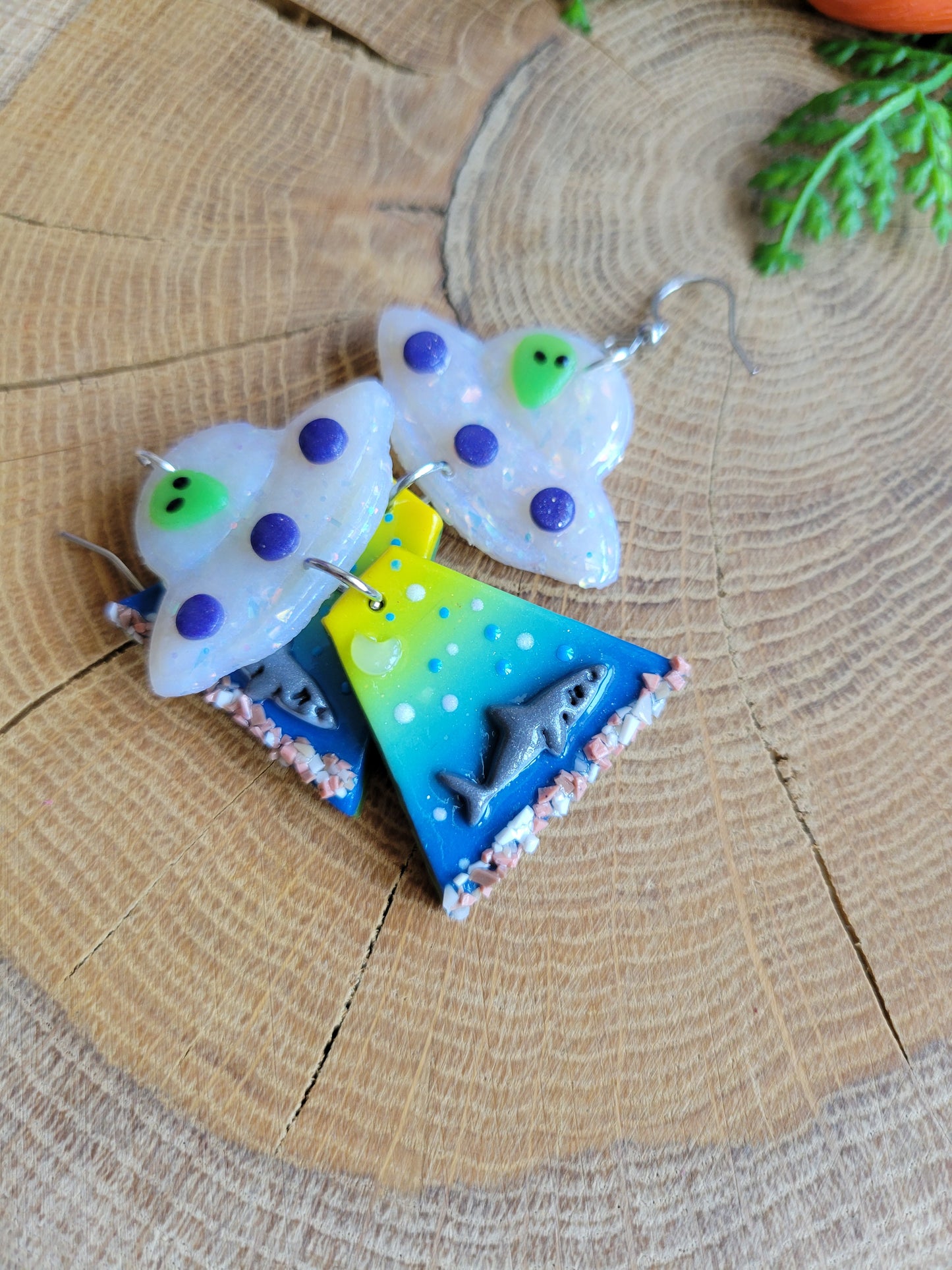 Alien Abduction: Great White Earrings.