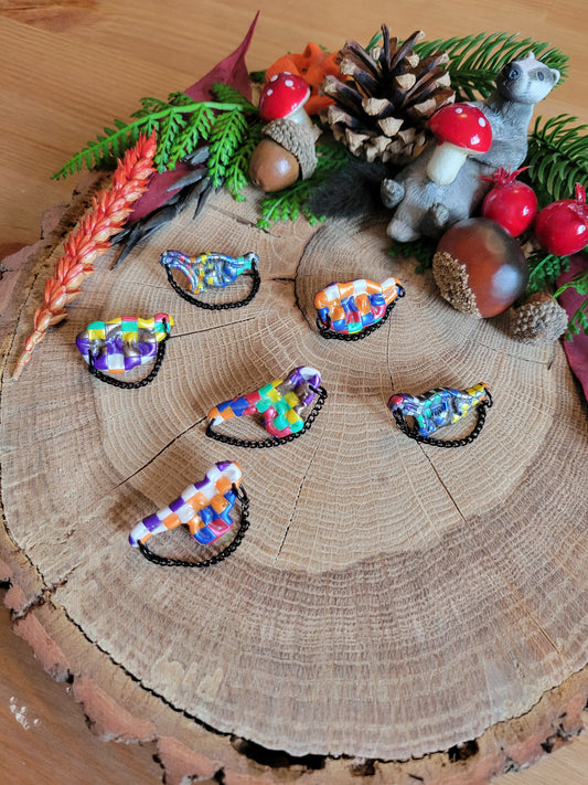 Glow in the Dark Checkered Dino Pins