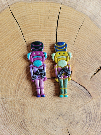 Mismatched Nutcreeper Earrings.