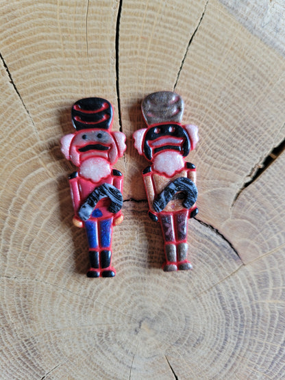 Mismatched Nutcreeper Earrings.