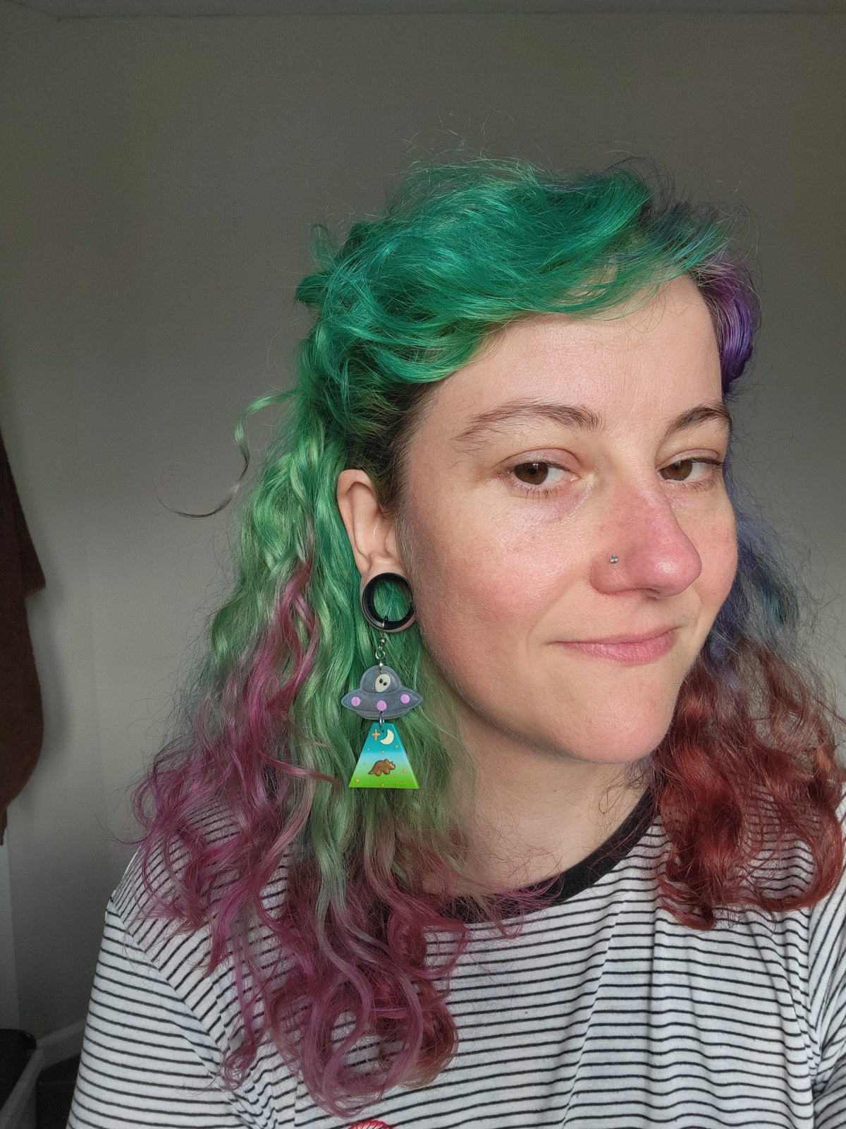 Alien Abduction: Triceratops Earrings.