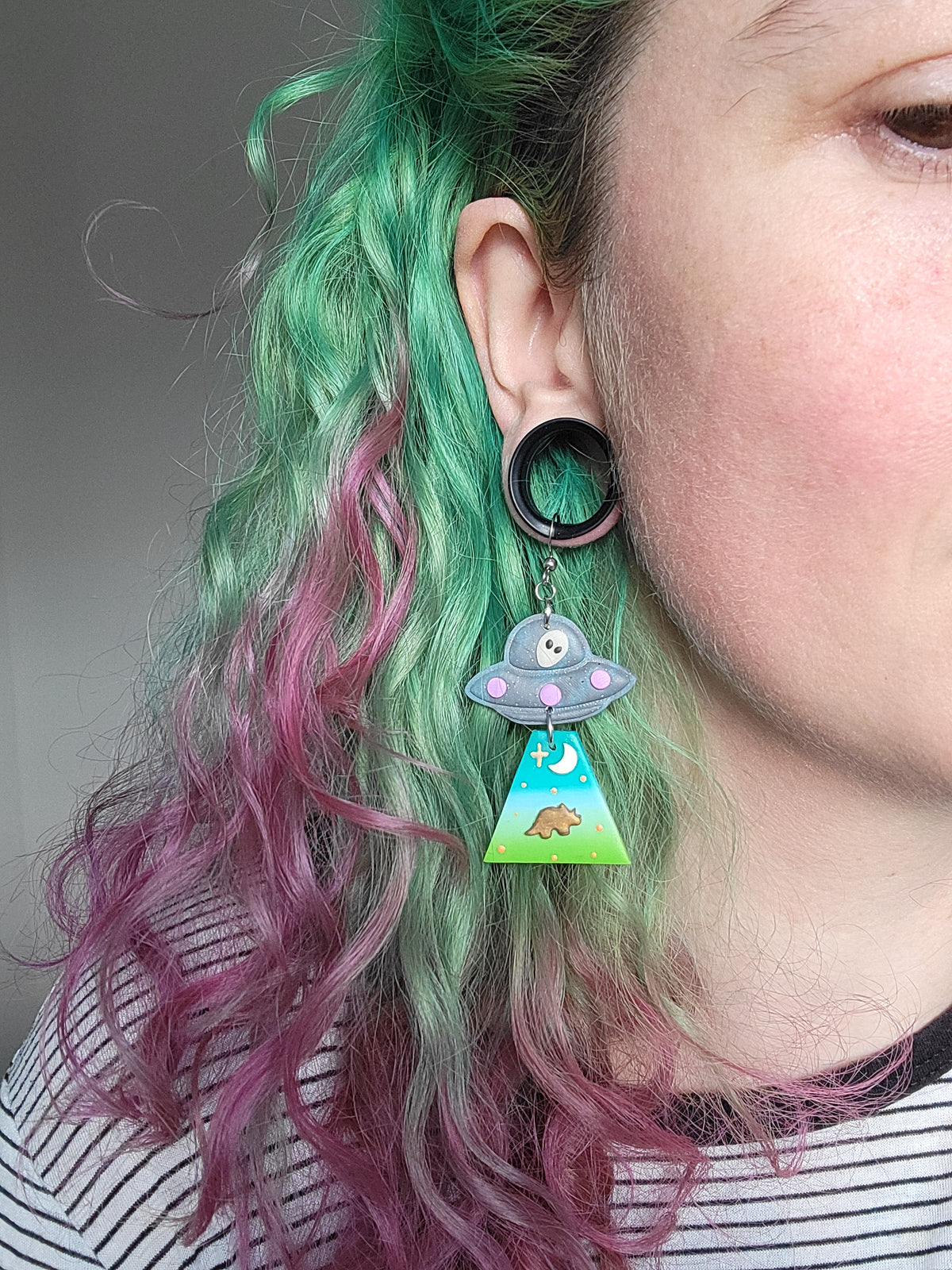 Alien Abduction: Triceratops Earrings.