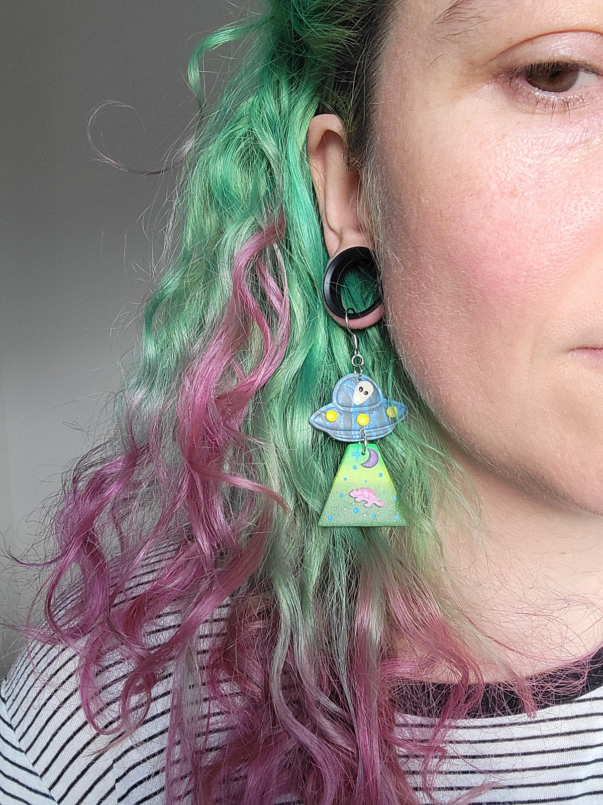 Alien Abduction: Pinky Ankylo Earrings.