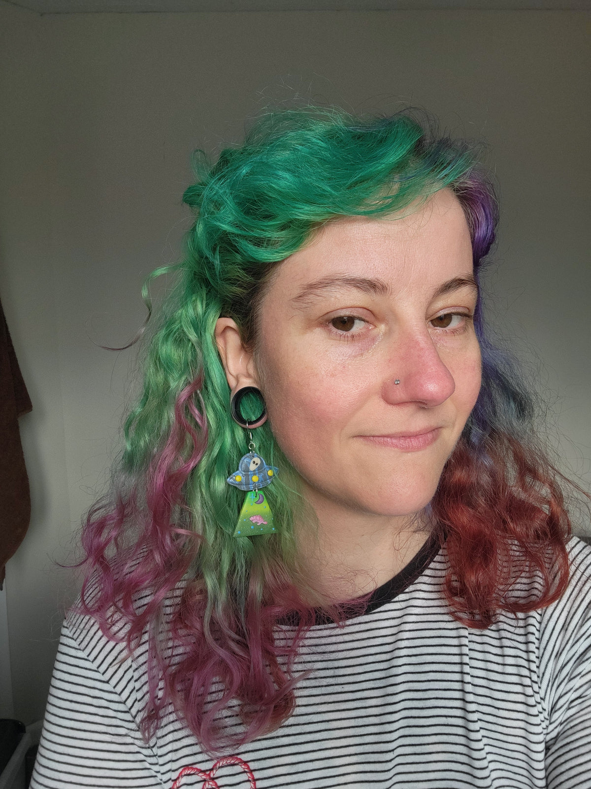 Alien Abduction: Pinky Ankylo Earrings.