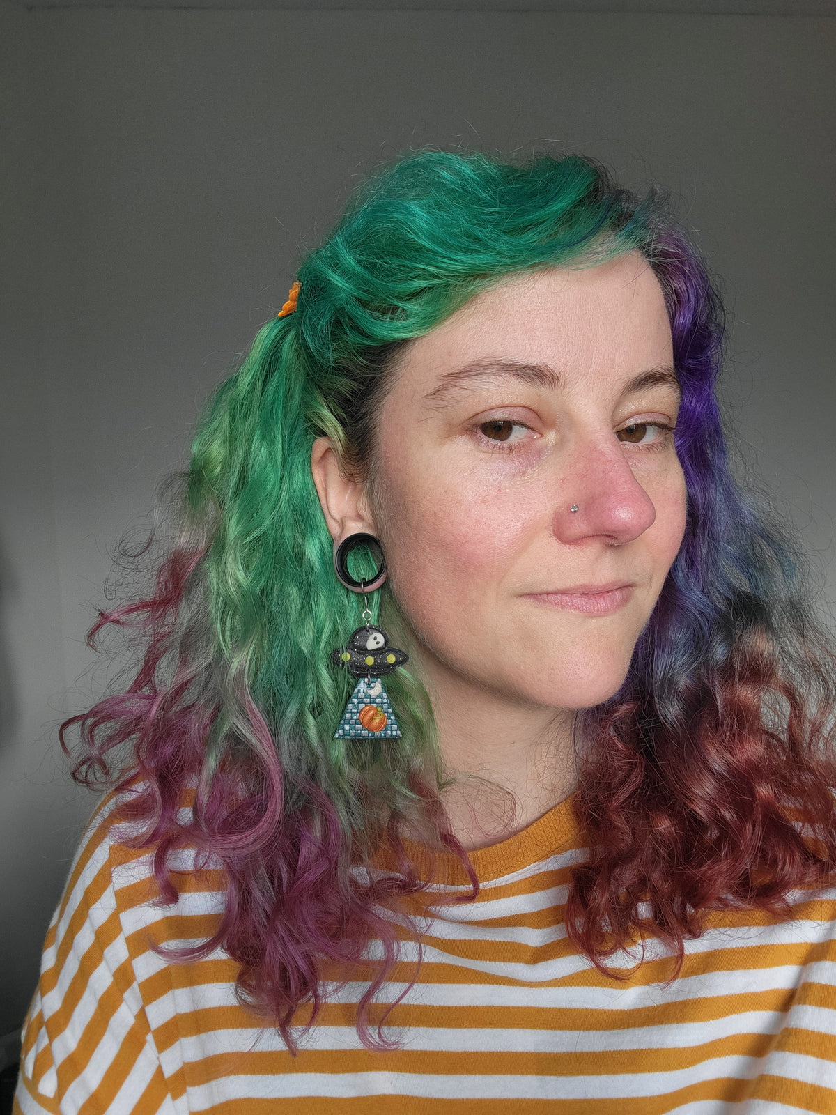 Alien Abduction: Checkered Pumpkin Earrings.