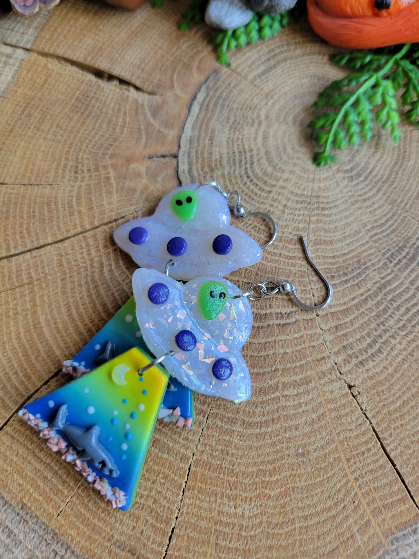 Alien Abduction: Great White Earrings.