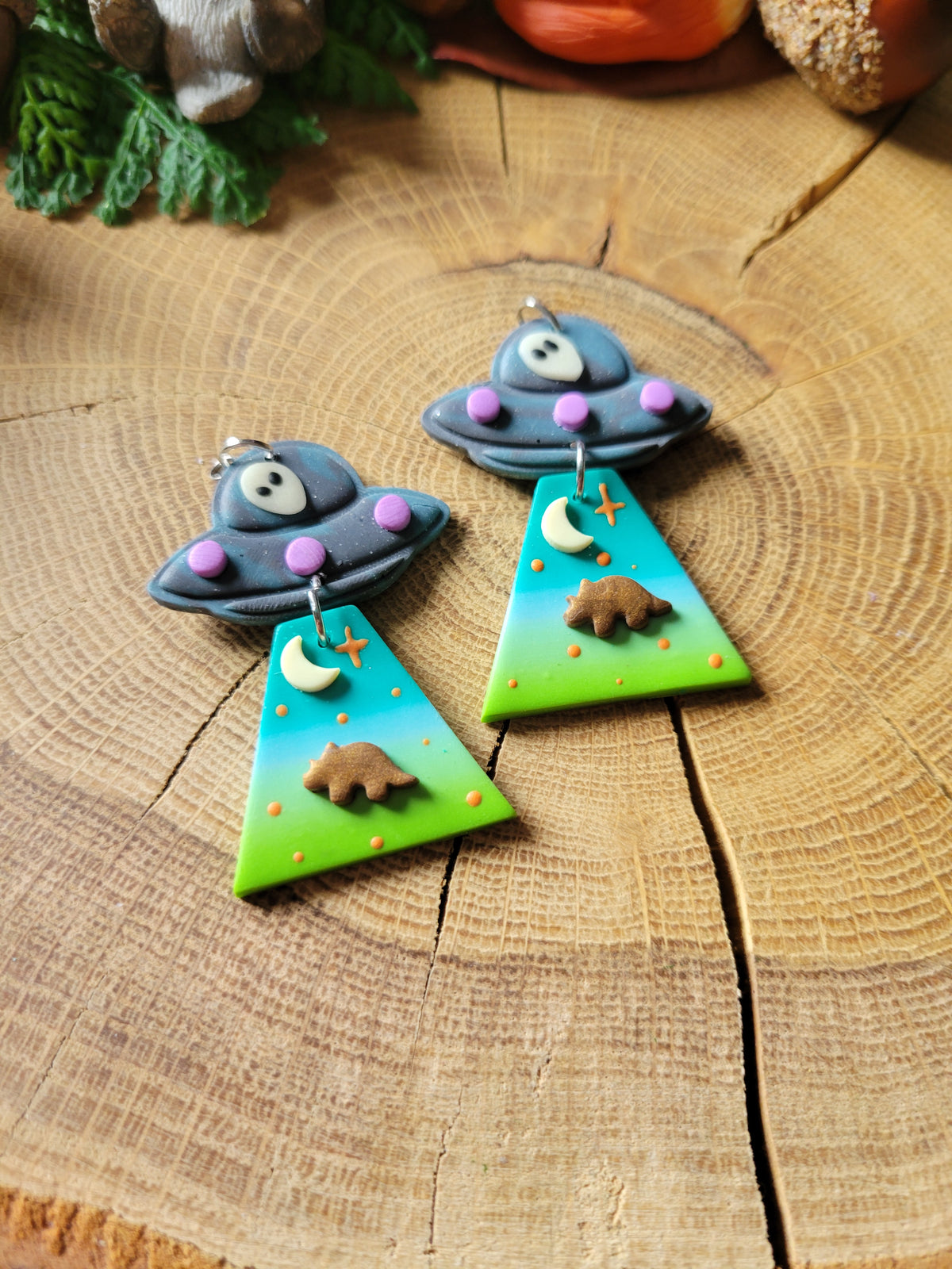 Alien Abduction: Triceratops Earrings.