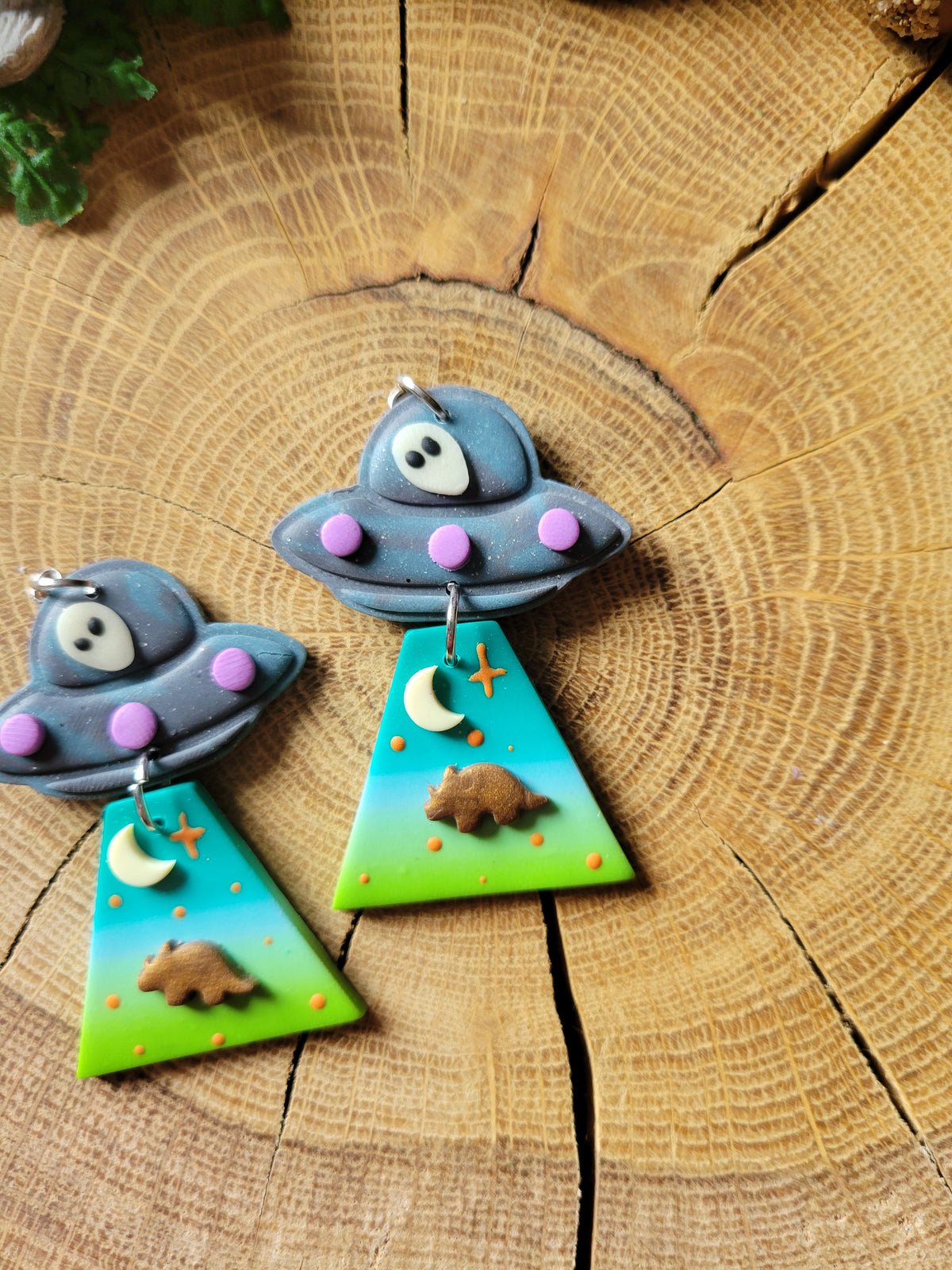 Alien Abduction: Triceratops Earrings.