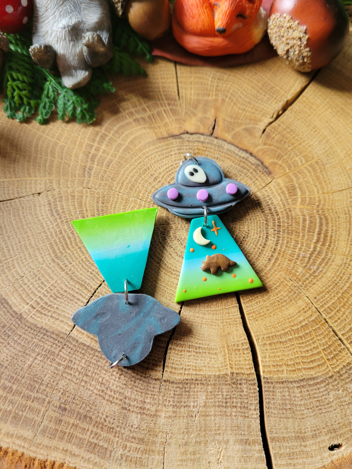 Alien Abduction: Triceratops Earrings.