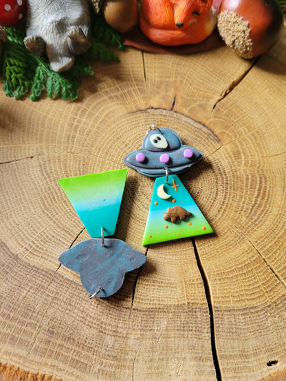 Alien Abduction: Triceratops Earrings.